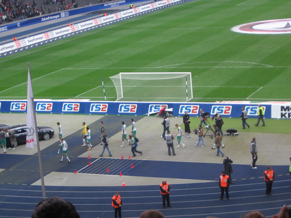 Mannschaft in der Kurve